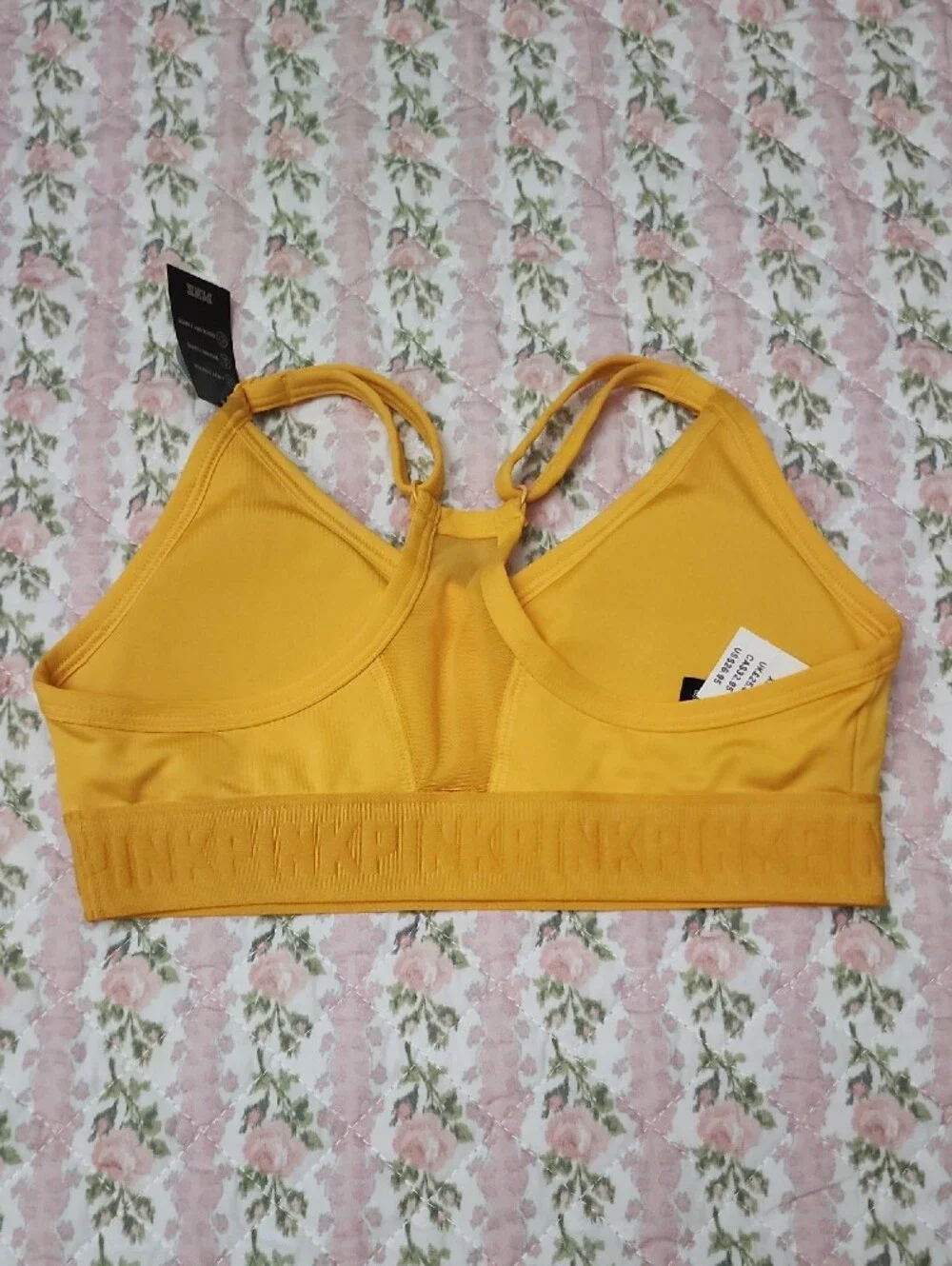 NWT PINK Ultimate Yellow Embossed Logo Crop Sports Bra XS XP